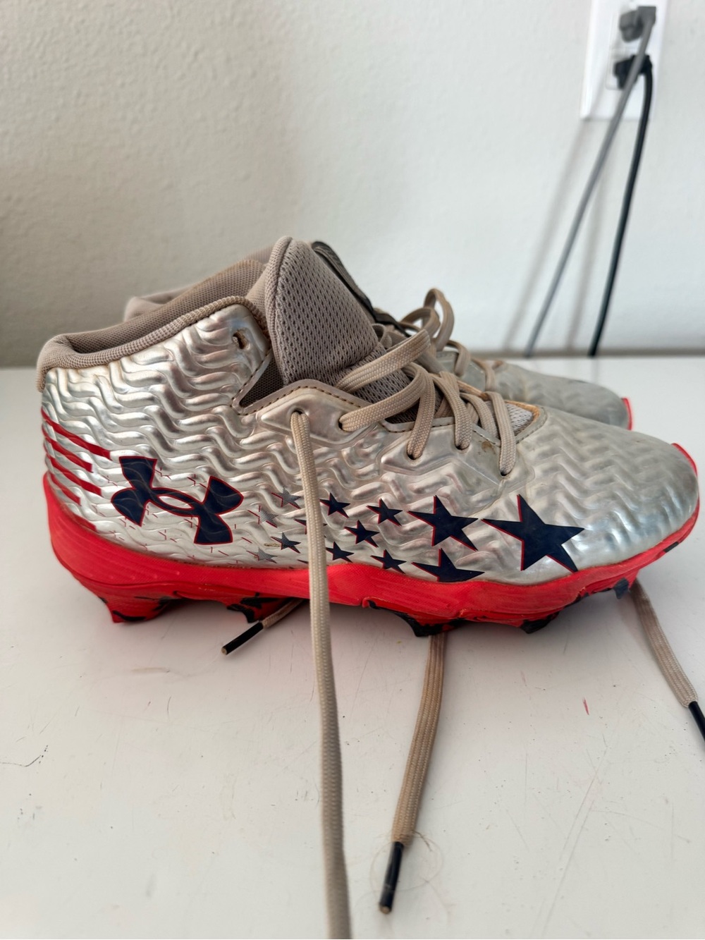 Under Armour Silver & Red Kids' Cleats with Navy Star Details
